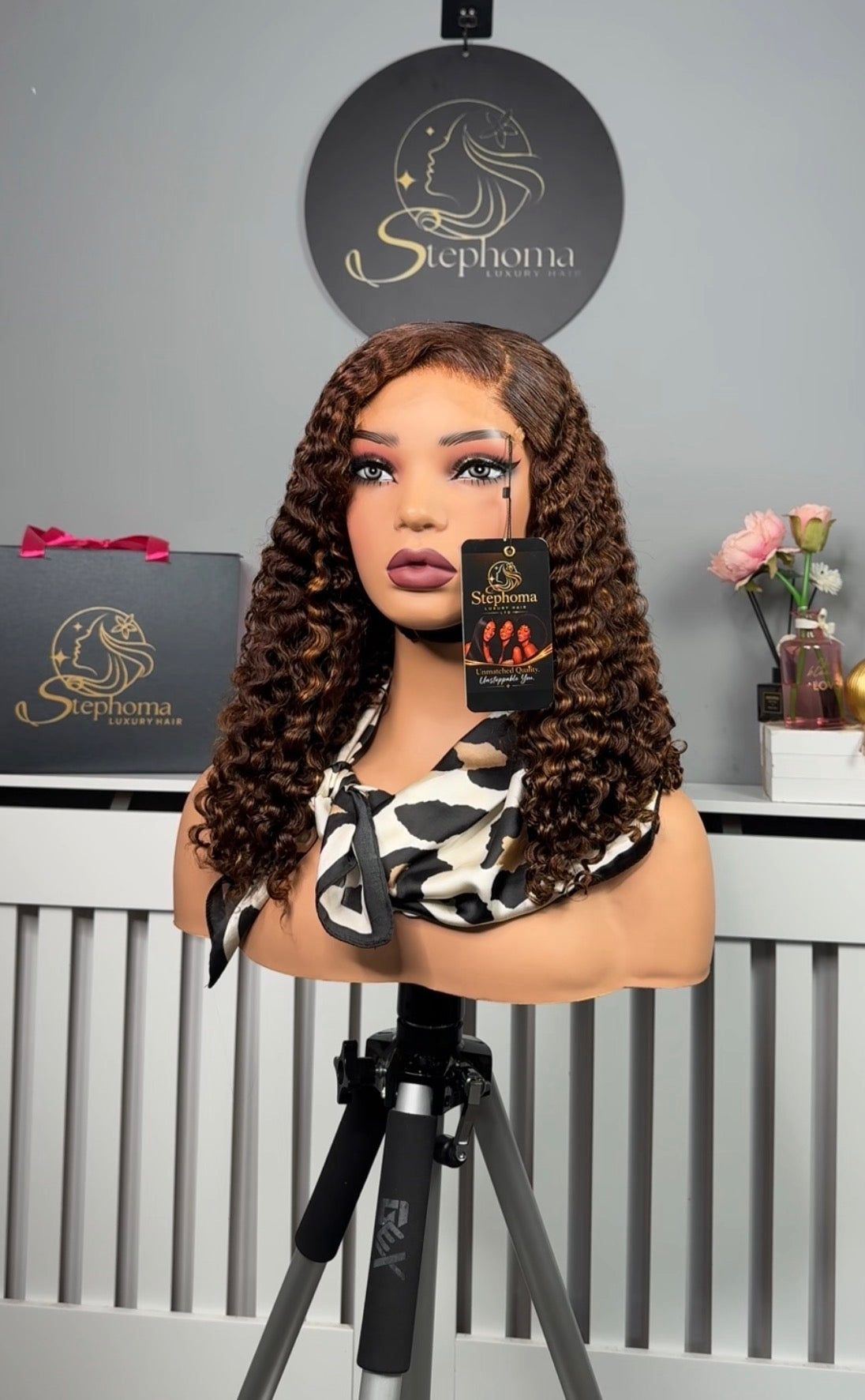 16” Iris Curly with 5by5 Lace Closure in Brown with Golden Highlights