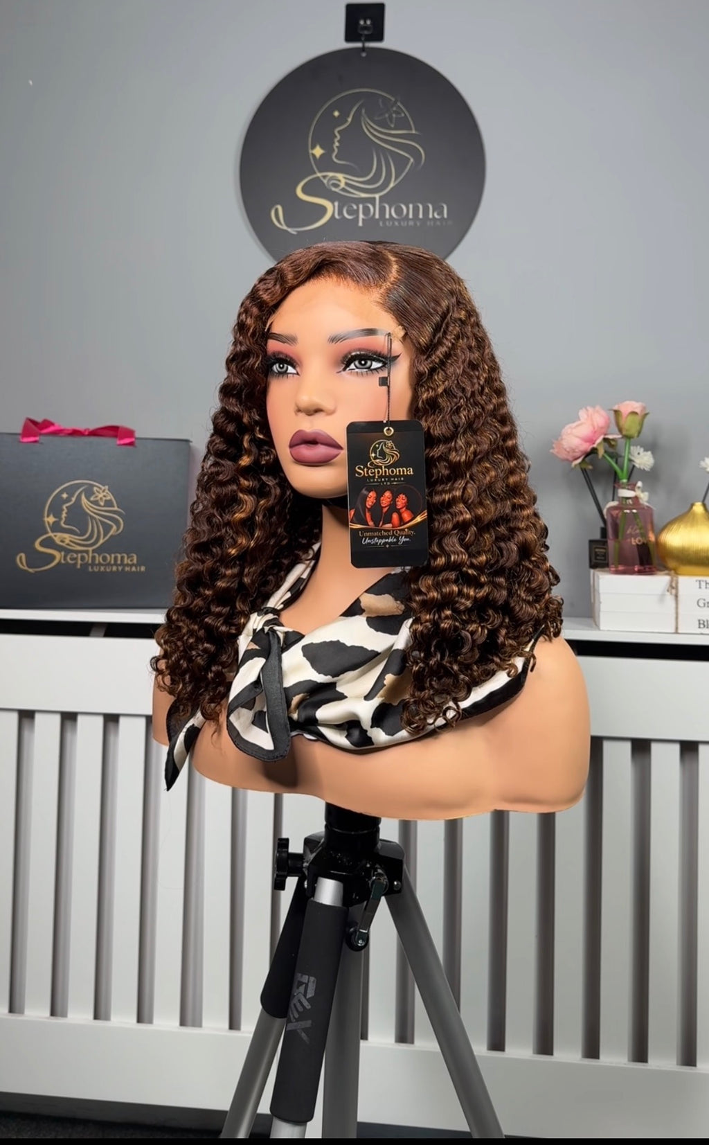 16” Iris Curly with 5by5 Lace Closure in Brown with Golden Highlights